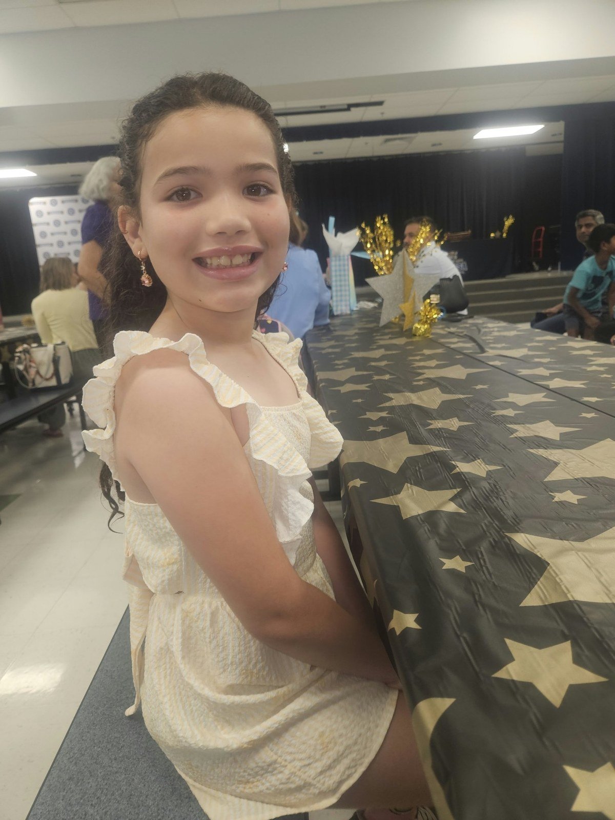 Ada smiling in her party dress